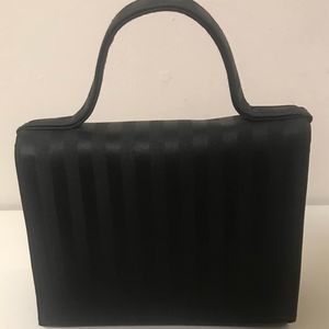 Small black purse snaps closed 6 3/4 X 6 Inches